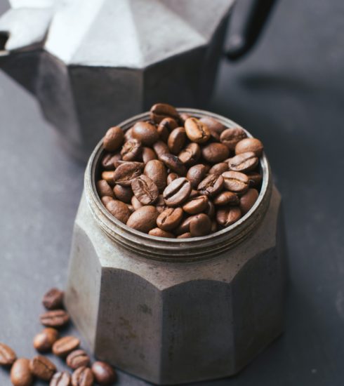 Coffee beans in vintage coffee jug
