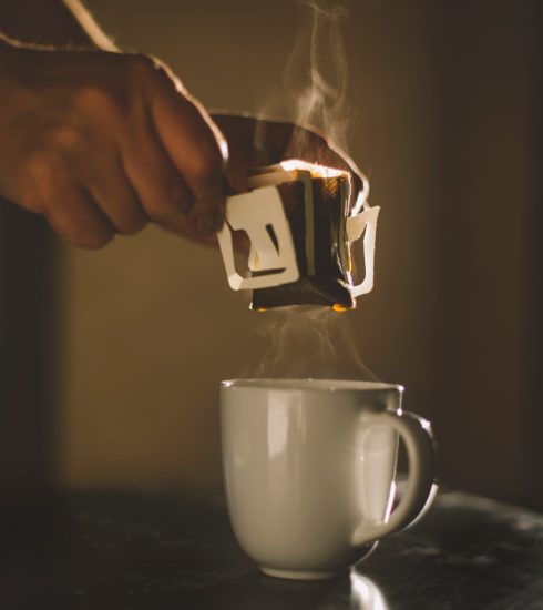 drip coffee bag in a mug , coffee concept