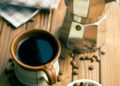 coffee with coffee beans and coffee maker
