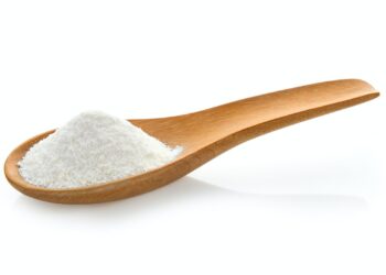 Creamer, Coffee whitener, Non-dairy creamer in wood spoon on whi