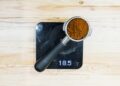 filter holder with coffee on the precision scale
