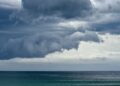 Storm clouds rolling in over the South Pacific and Pebbly Beach at the Murramarang National Park.