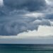 Storm clouds rolling in over the South Pacific and Pebbly Beach at the Murramarang National Park.