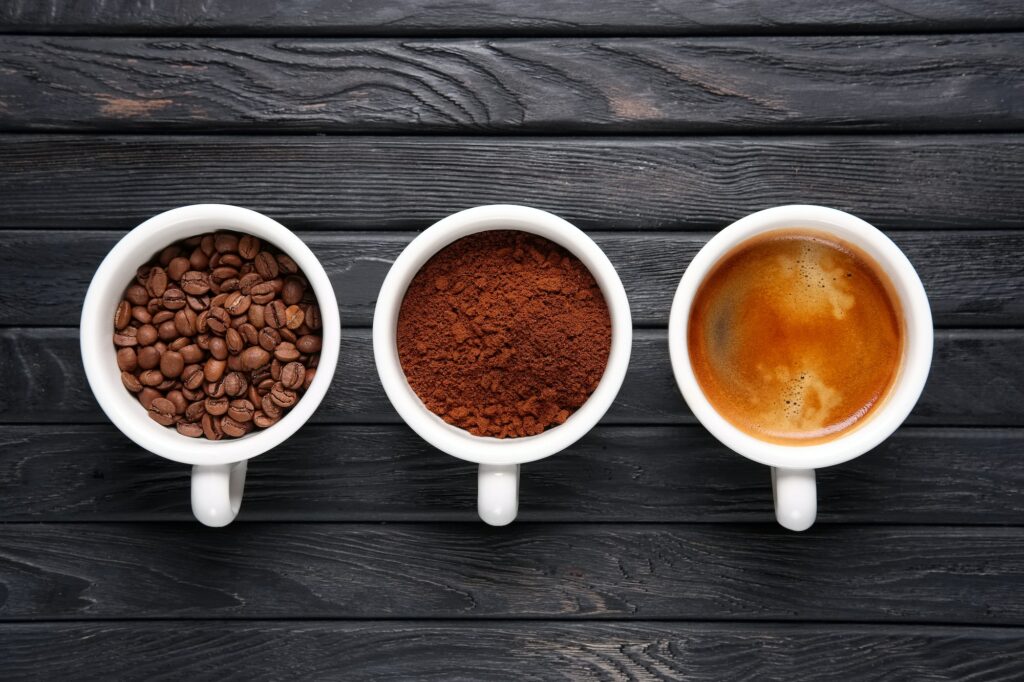 Three stages of coffee - beans, ground coffee and welded coffee