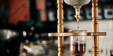 alternative way of espresso brewing, cold water dripping on ground coffee in cold brew coffee maker