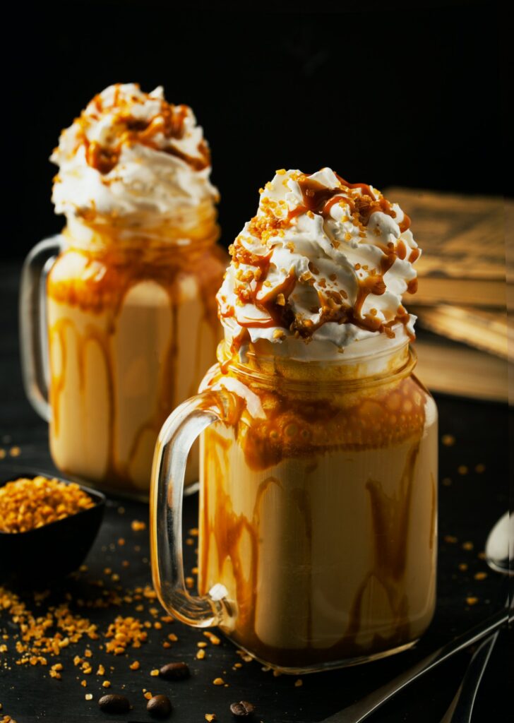 Delicious coffee with caramel and cream