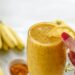 Yellow smoothie made from fresh healthy organic ingredients