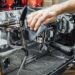 Barista cleaning the coffee maker