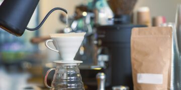 Third wave coffee brewing method: V60 coffee dripping iview from a vintage coffee shop.