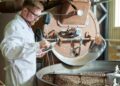 Worker Roasting Coffee at Factory