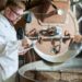 Worker Roasting Coffee at Factory